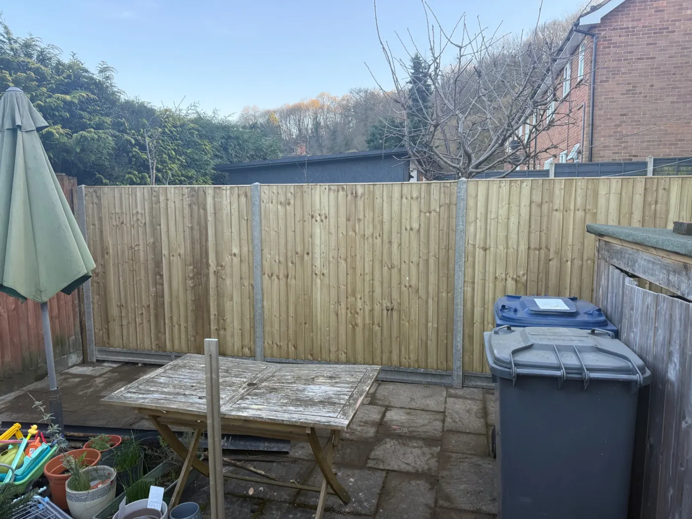 New garden fencing with concrete posts in a GU9 back garden