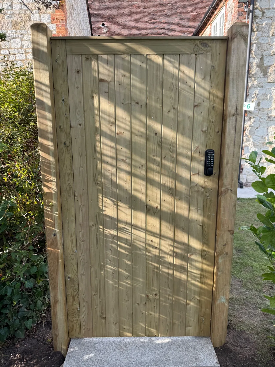 Tongue and groove side gate with keypad lock fitted in Farnham