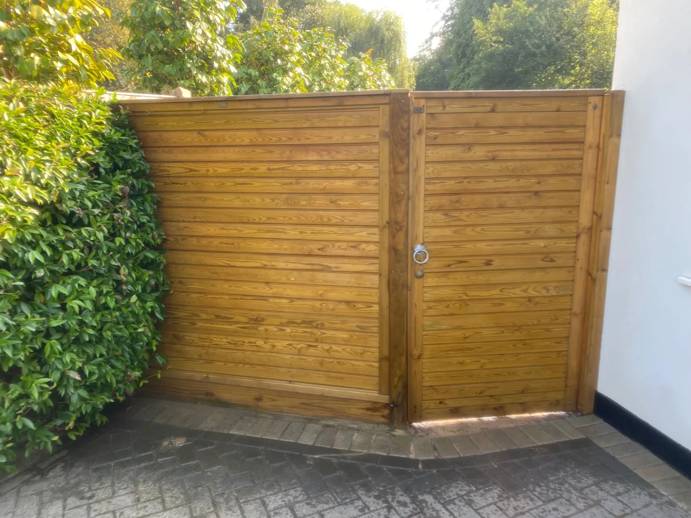 Wide horizontal board gates fitted beside a Farnham driveway
